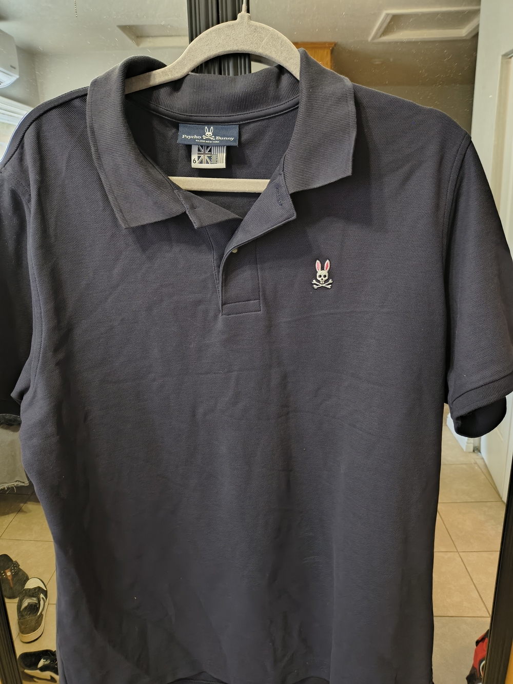 Psycho Bunny Navy Polo with Pink Logo Emblem